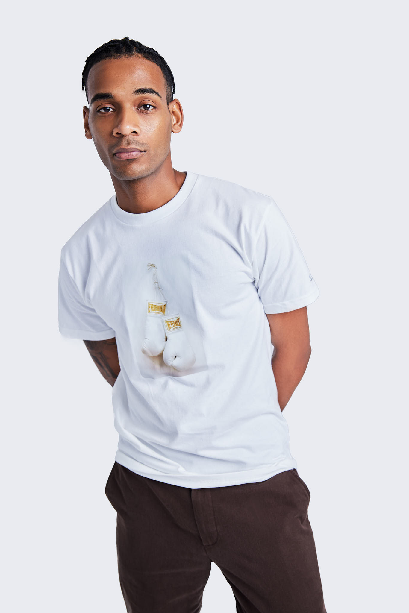 American flag flying against a cloudy sky