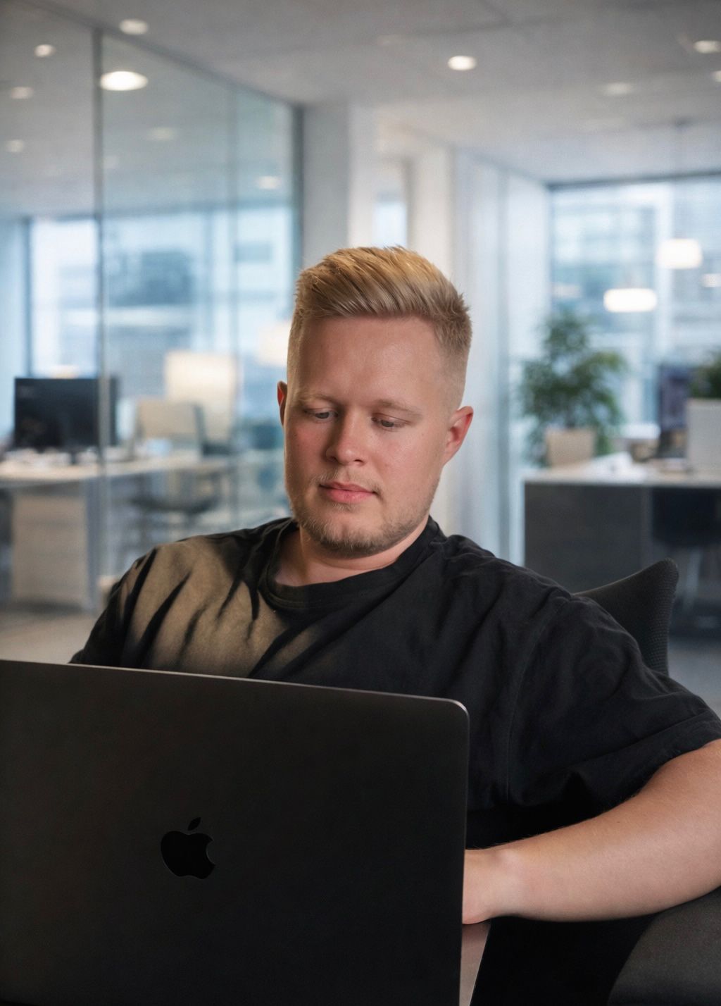 person sitting in a chair in front of a man