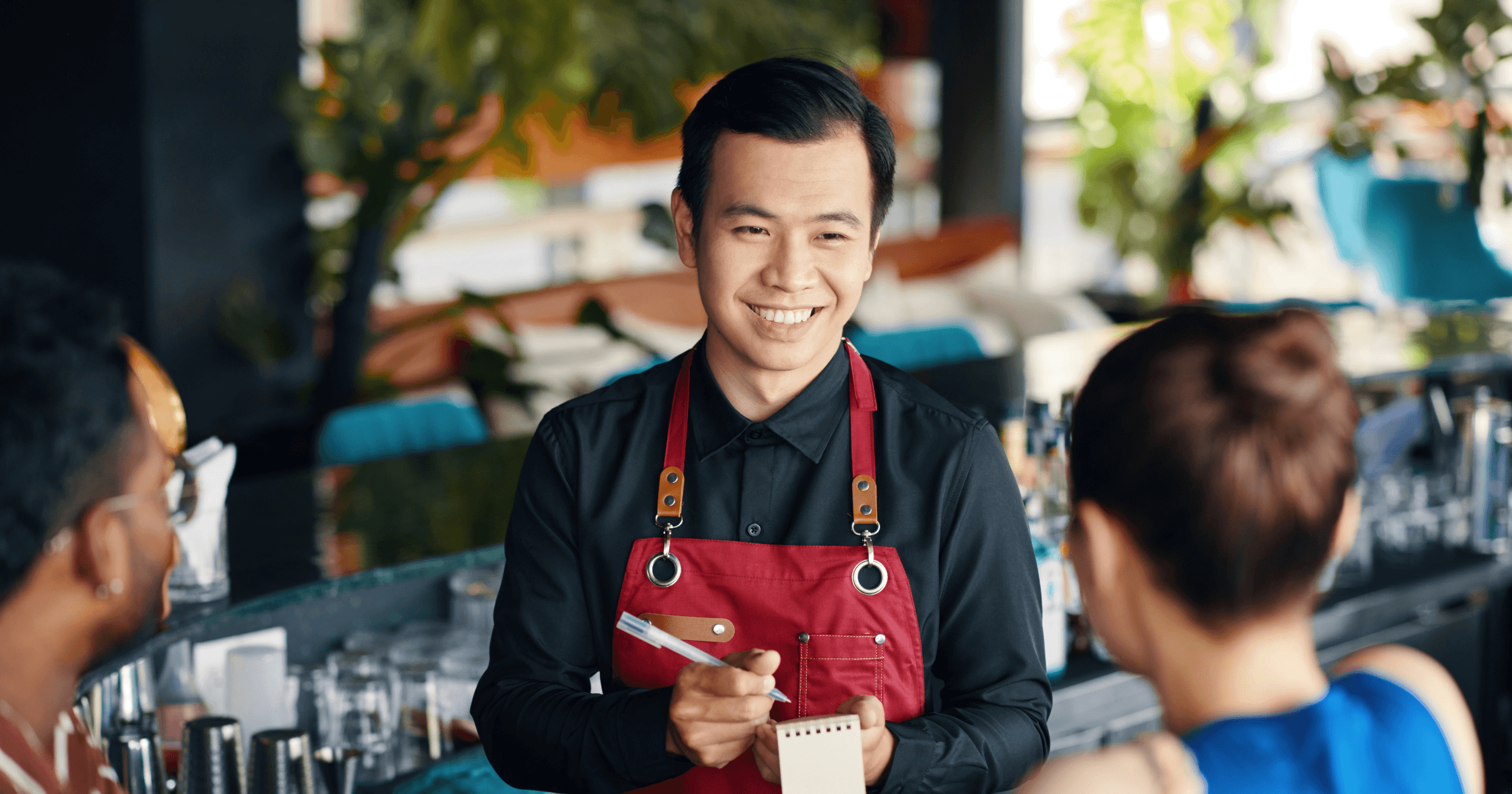 Restaurant staff taking orders