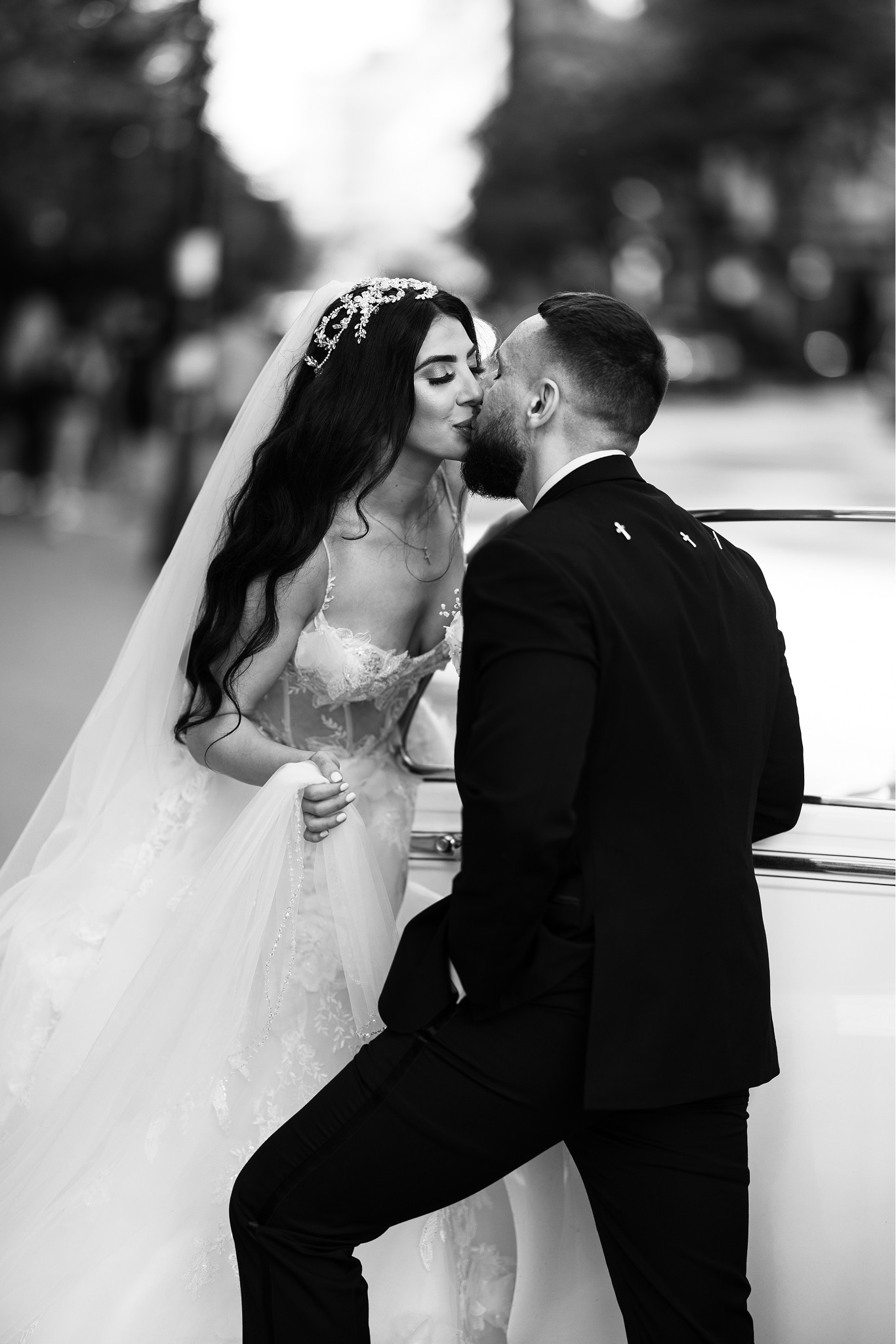 a woman holding a red flower