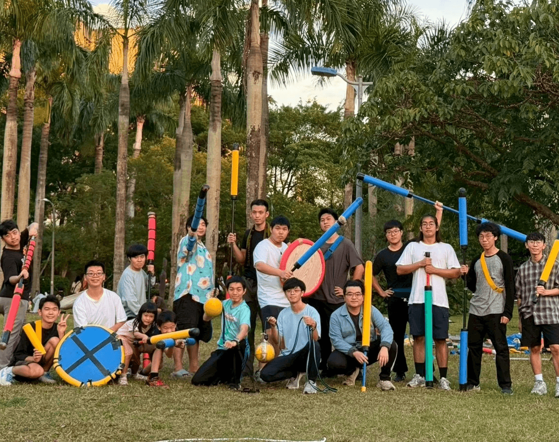 husband and wife working happily on a laptop