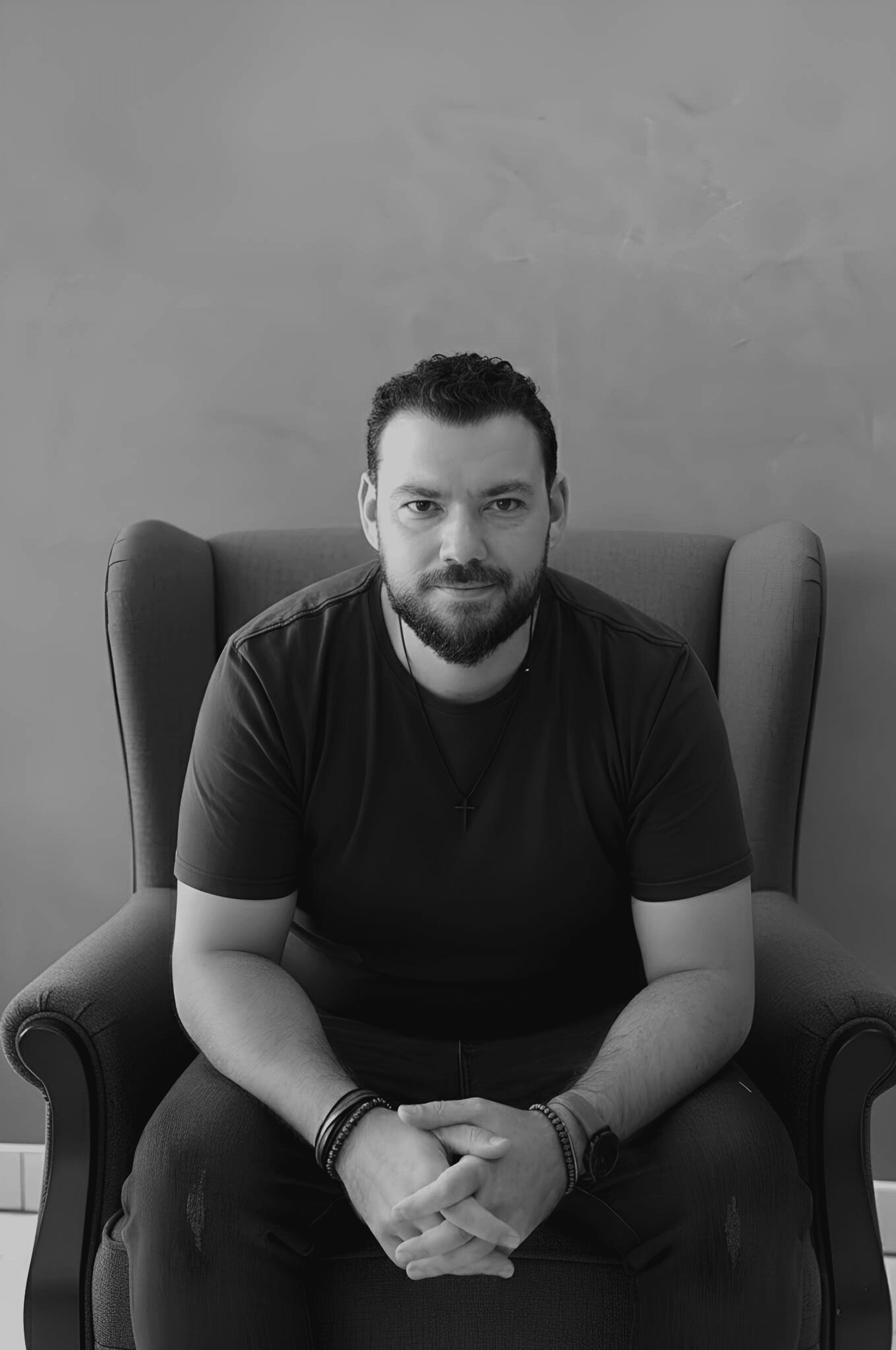 a blurry photo of a person standing in front of a wall