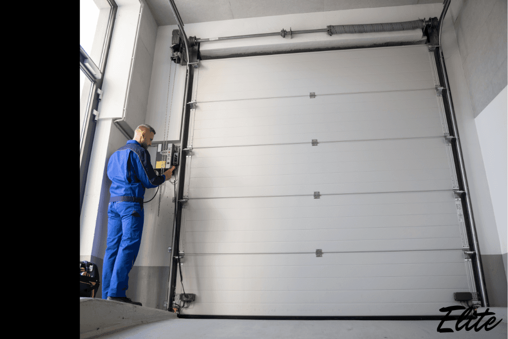 Technician adjusting garage door opener controls, showing maintenance steps for openers, motors, and doors.