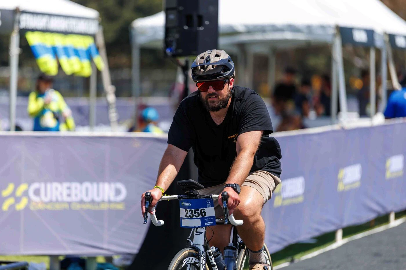 Closeup shot of Eagle Paving bicyclist riding during challenge