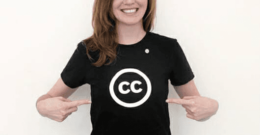A student researcher reviewing Creative Commons license options before submitting an academic paper for publication