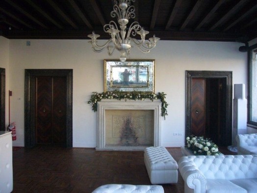 living room fireplace with white couch