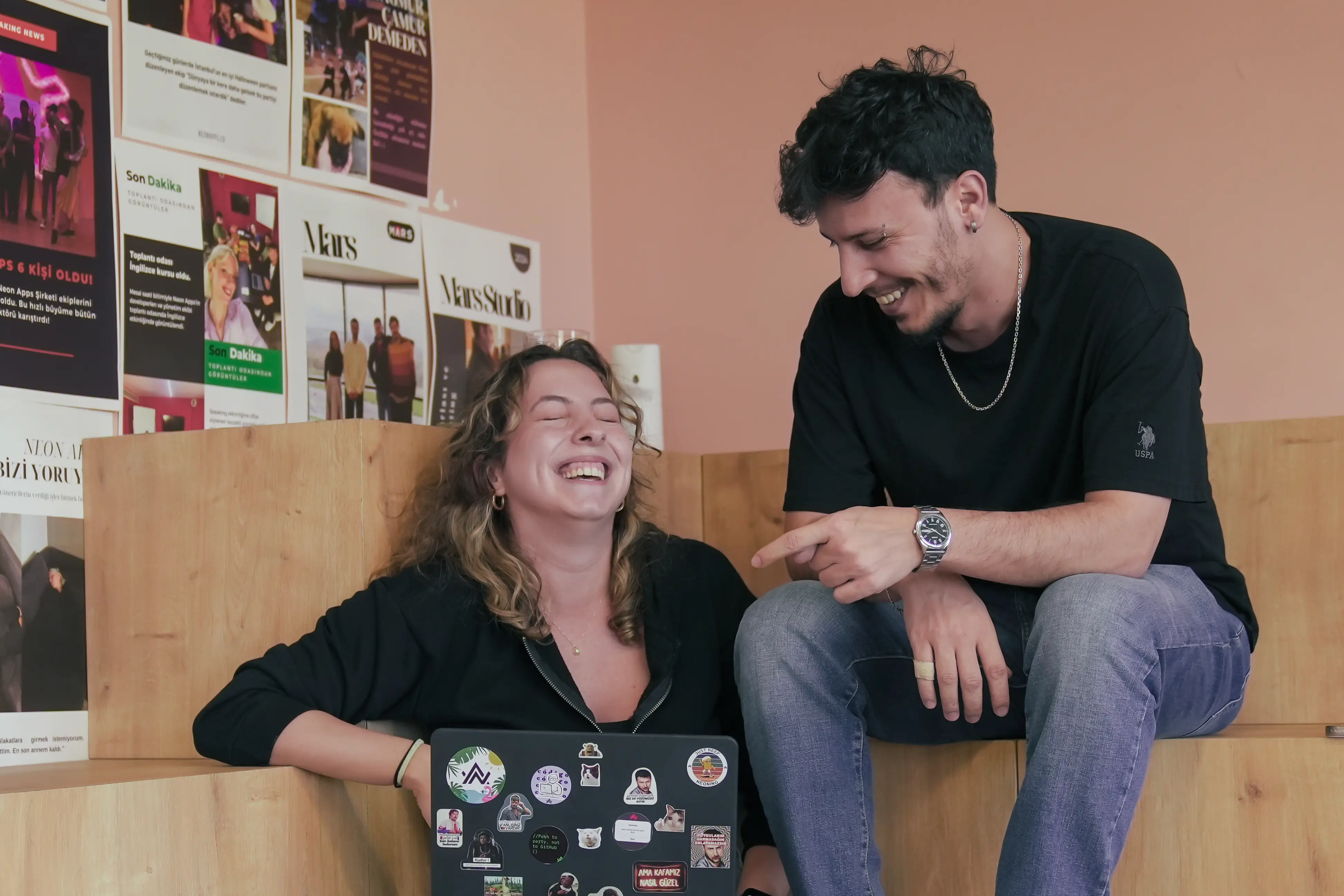 Neon Apps team collaborating while working on app modernization projects.