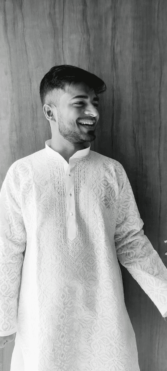 A young man riding a bicycle