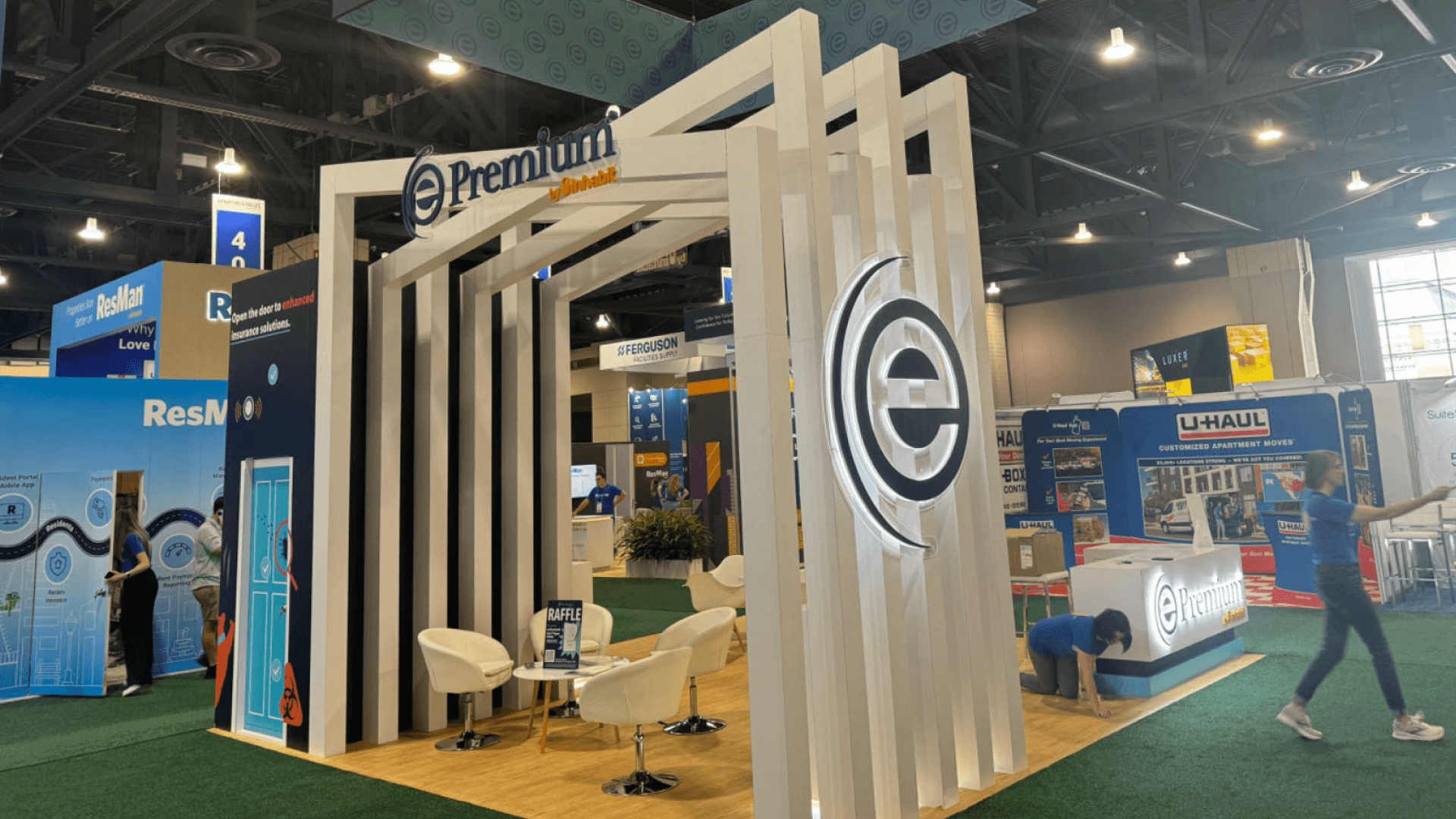 Epremium NAA 2024 20x20 professional service booth with meeting pocket, seating area, vertical frame structure, and controlled visitor flow