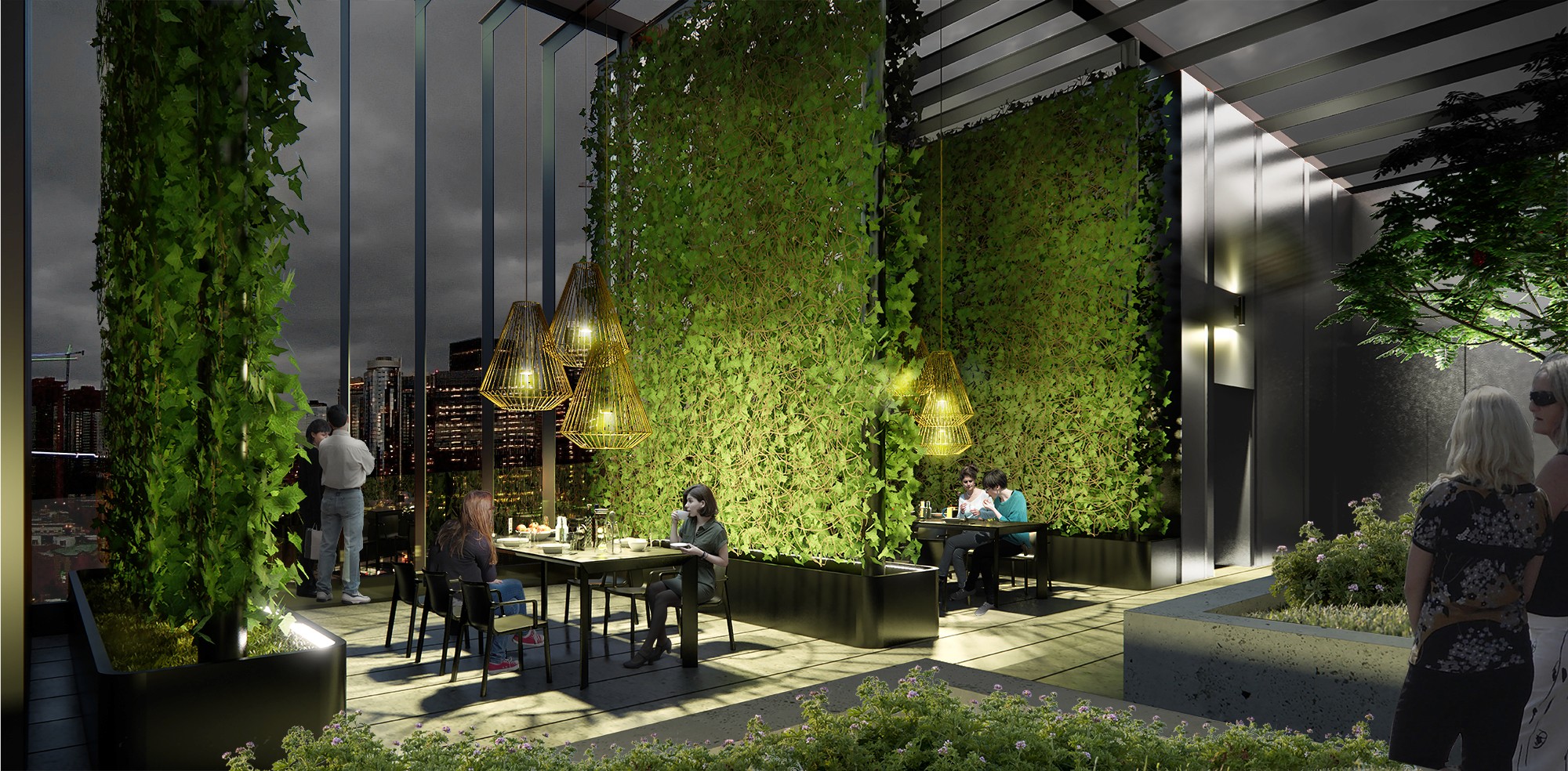 The rooftop amenity space with a row of outdoor meeting rooms framed by full-story green walls.