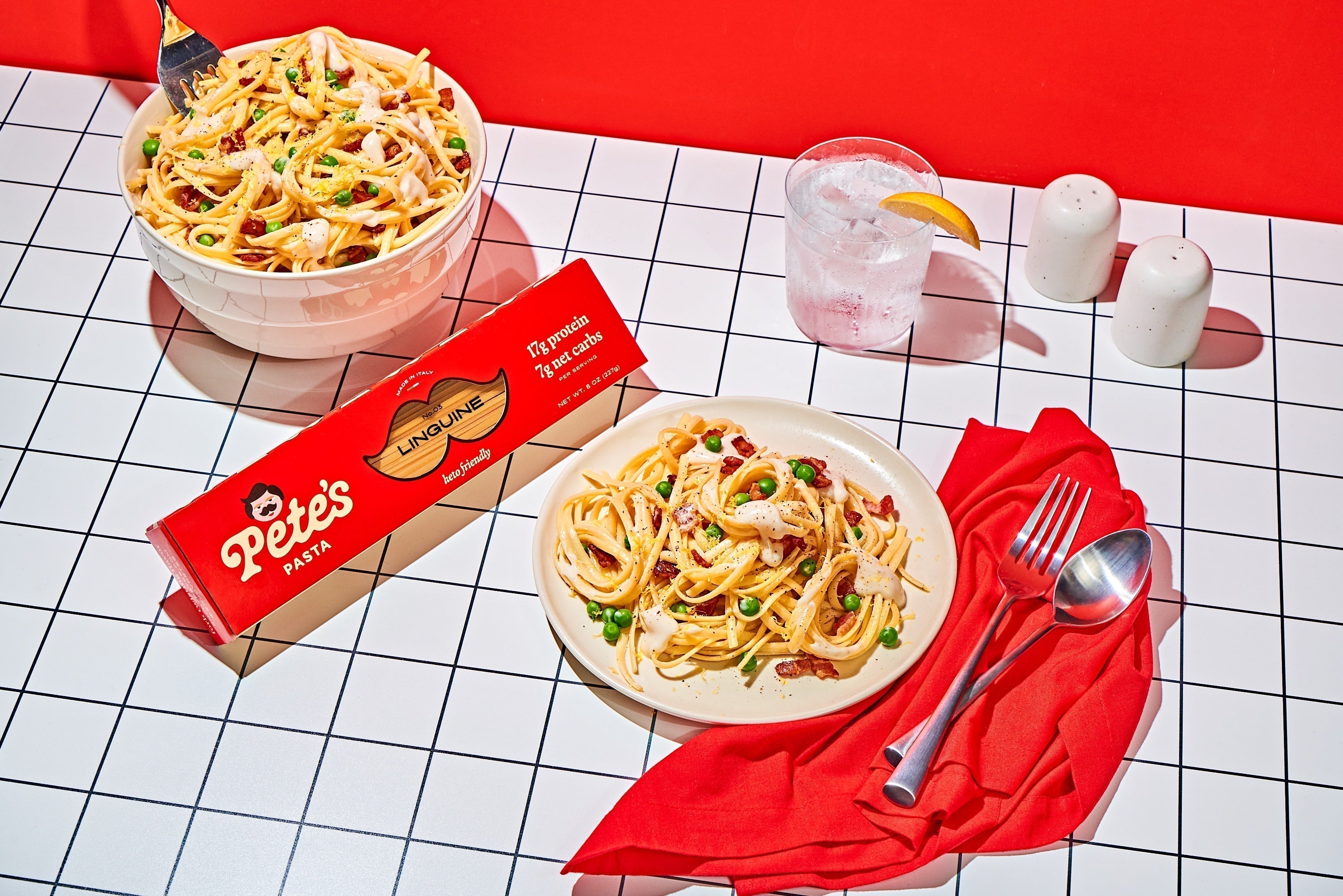 Pete’s Pasta package and dishes on a red gingham table
