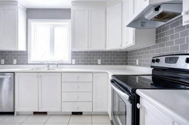 Cabinet Refinish & Backsplash — after