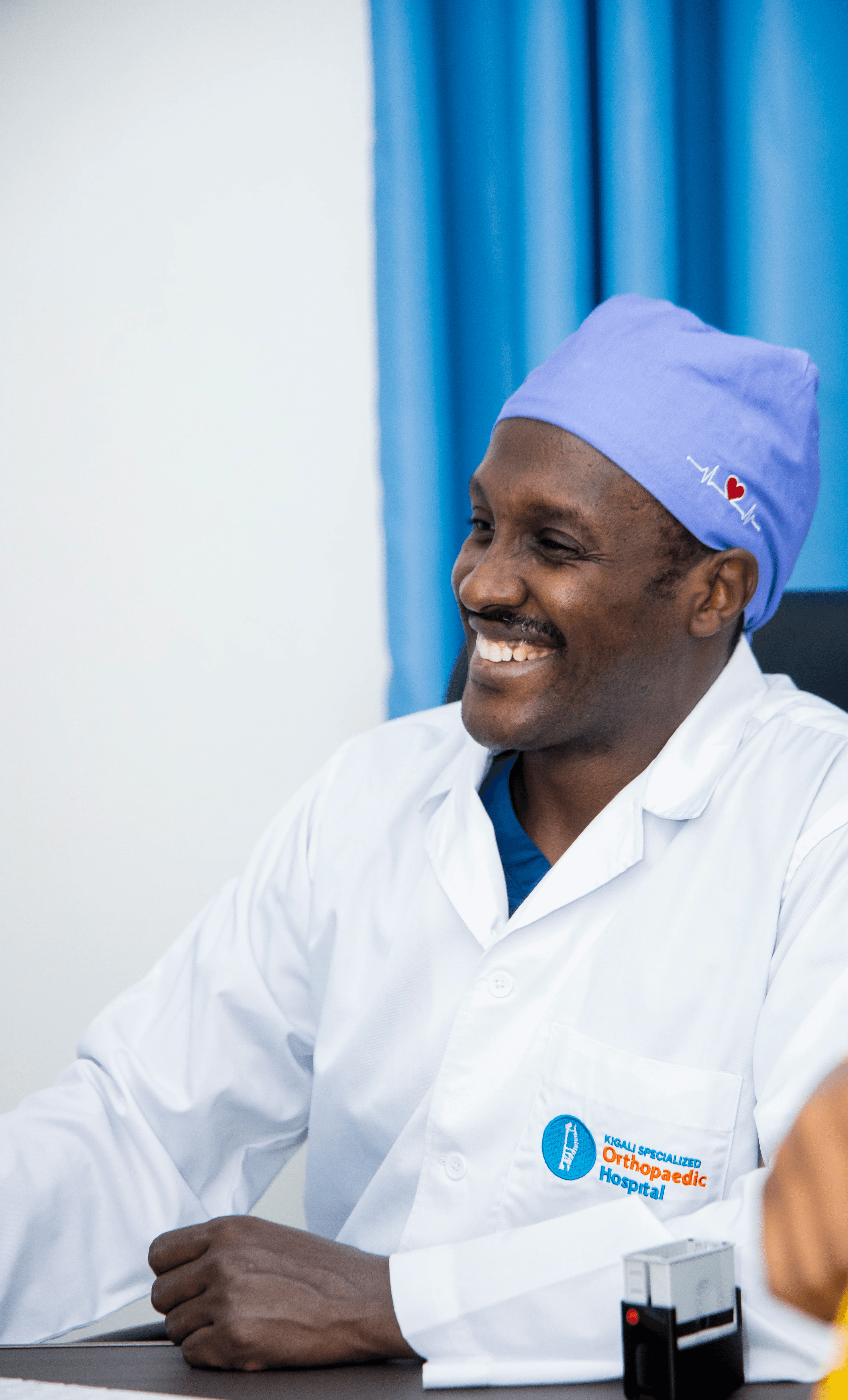 Doctor talking with her elder patient