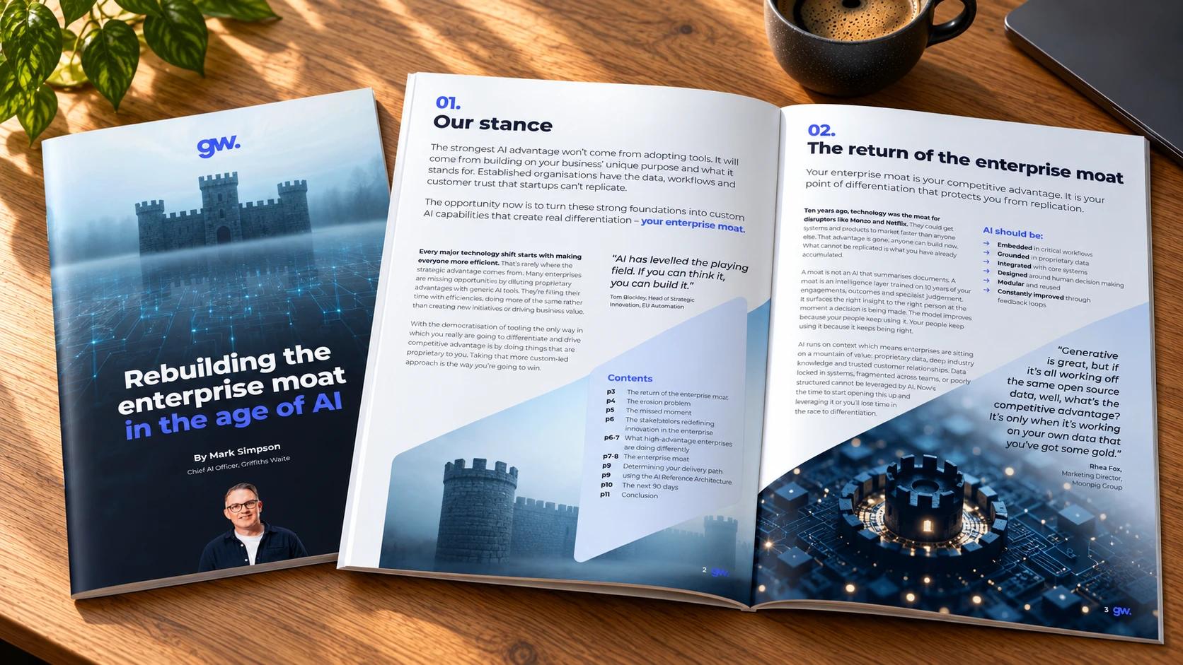 The enterprise moat whitepaper printed and open on a wooden desk, beside its cover