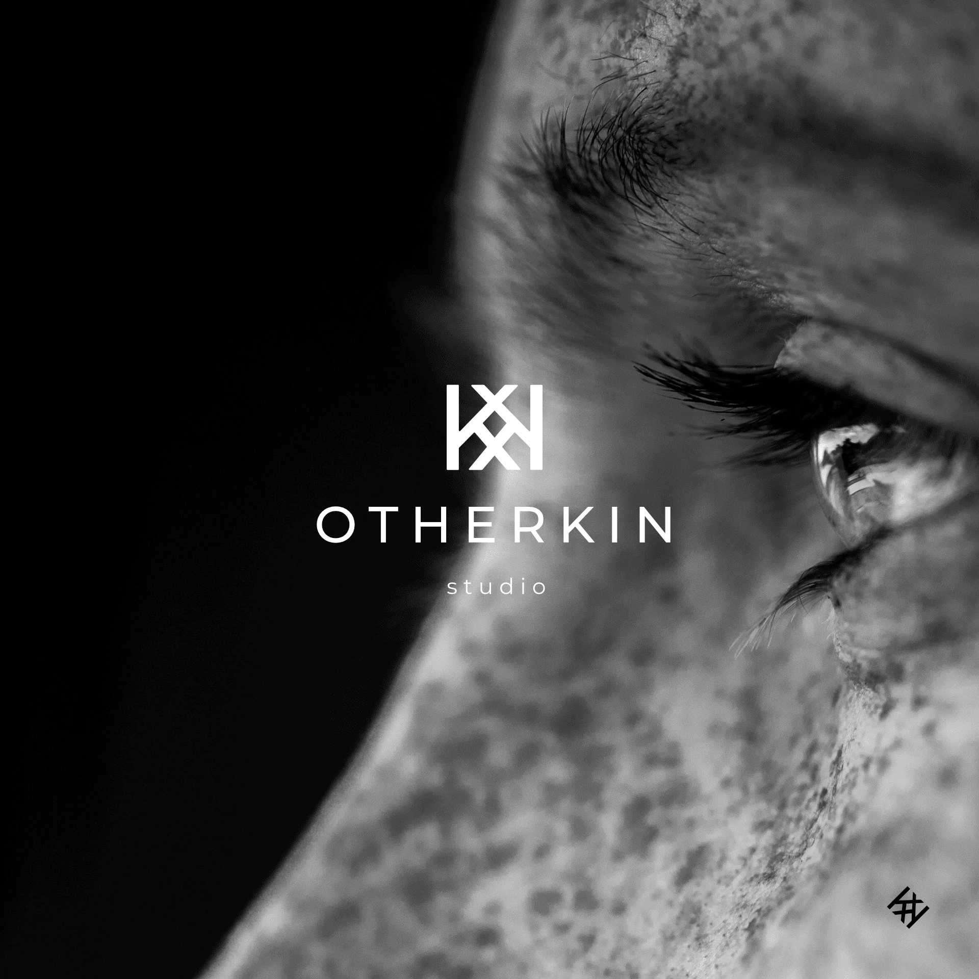 Black-and-white band identity graphic with “OTHERKIN” logo.