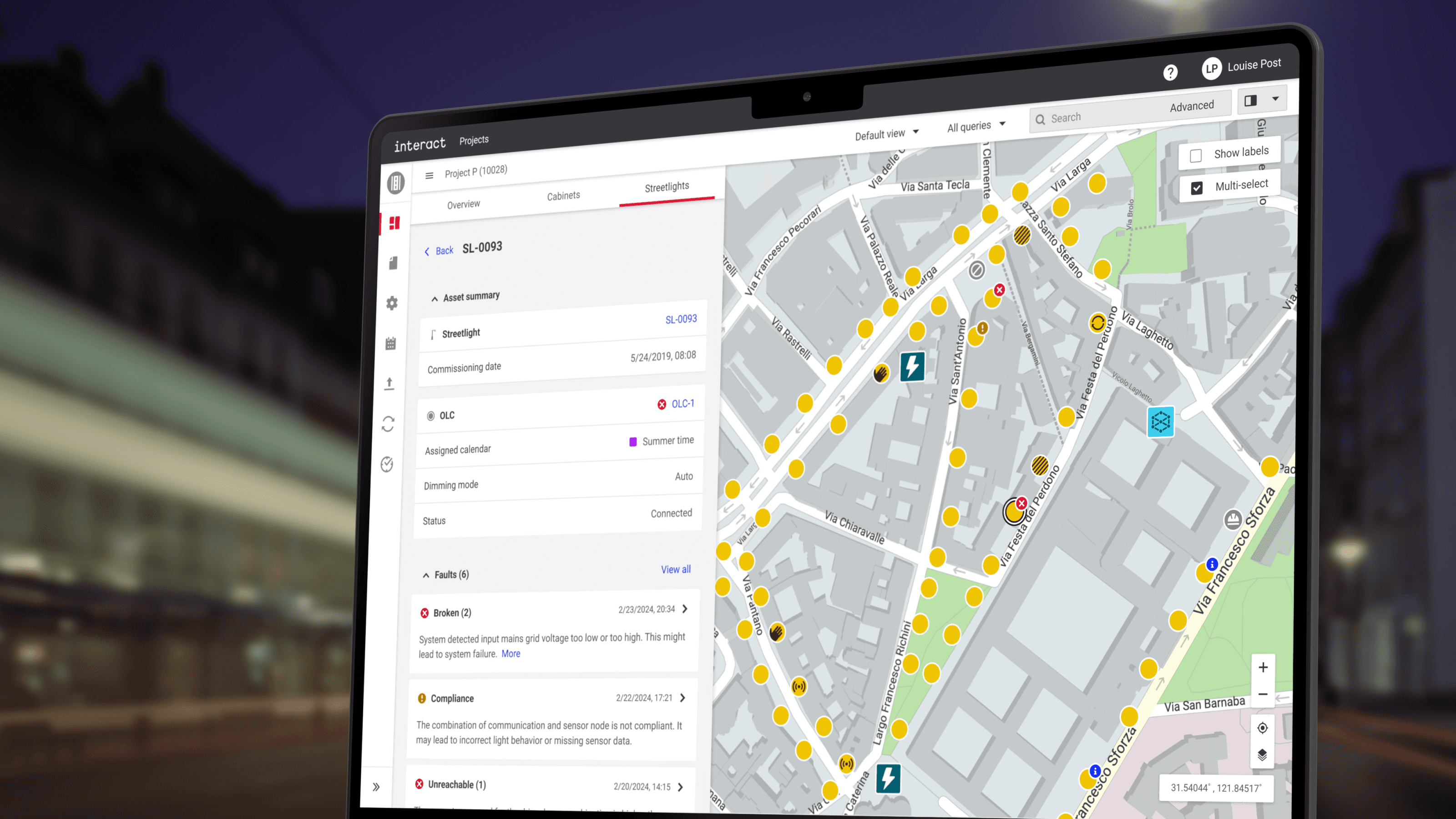 Laptop running the Interact City app