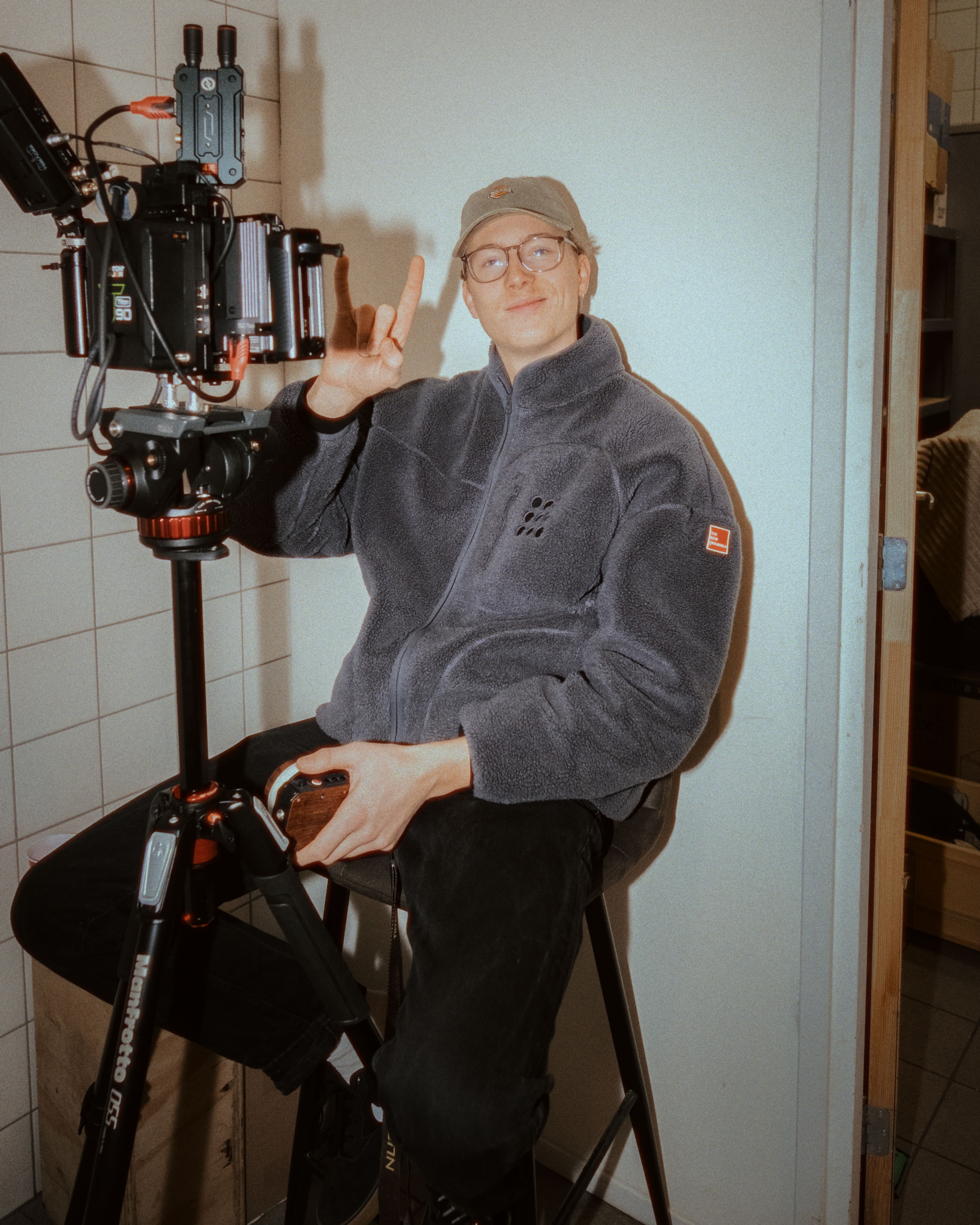 Streetside billboard with flyposters of the Batch.Works brand and illustrations