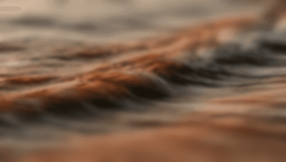 Abstract photography of blurred motion, rushing water or wind-swept sand