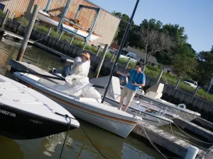 Sailboats docked at summer marina