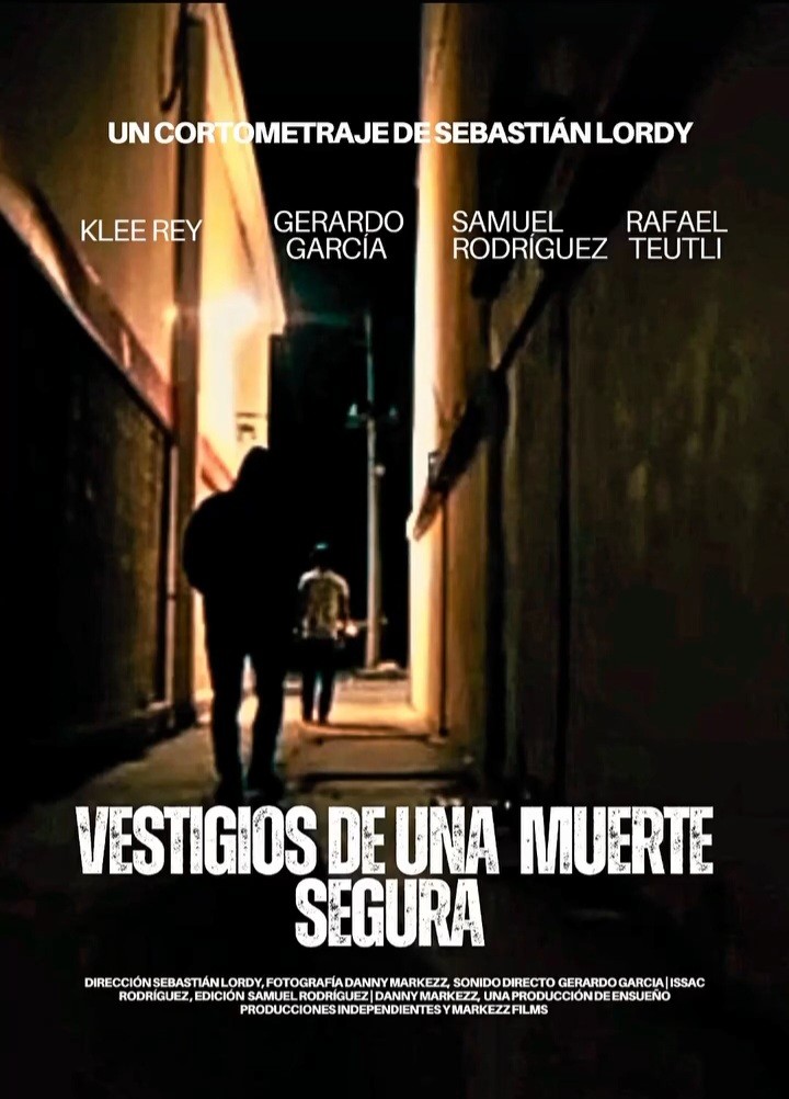 Woman in a light suit sitting thoughtfully against a terracotta wall