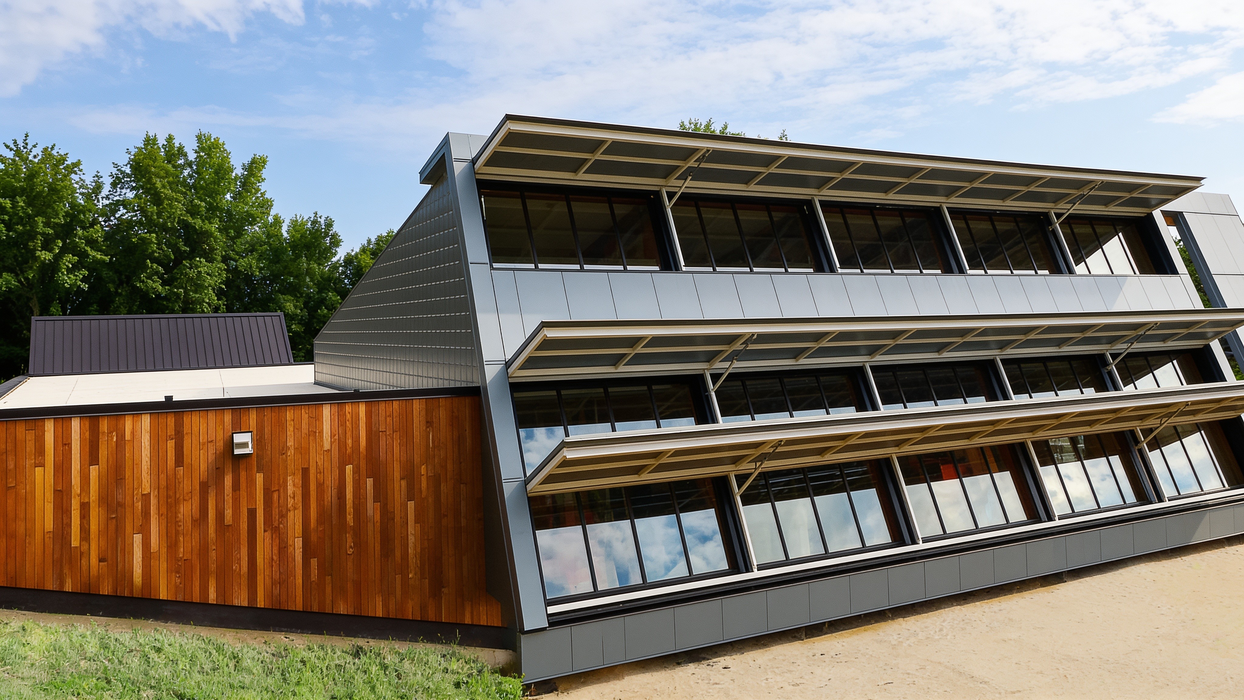Custom wood-clad building with PowerLift hydraulic doors and windows