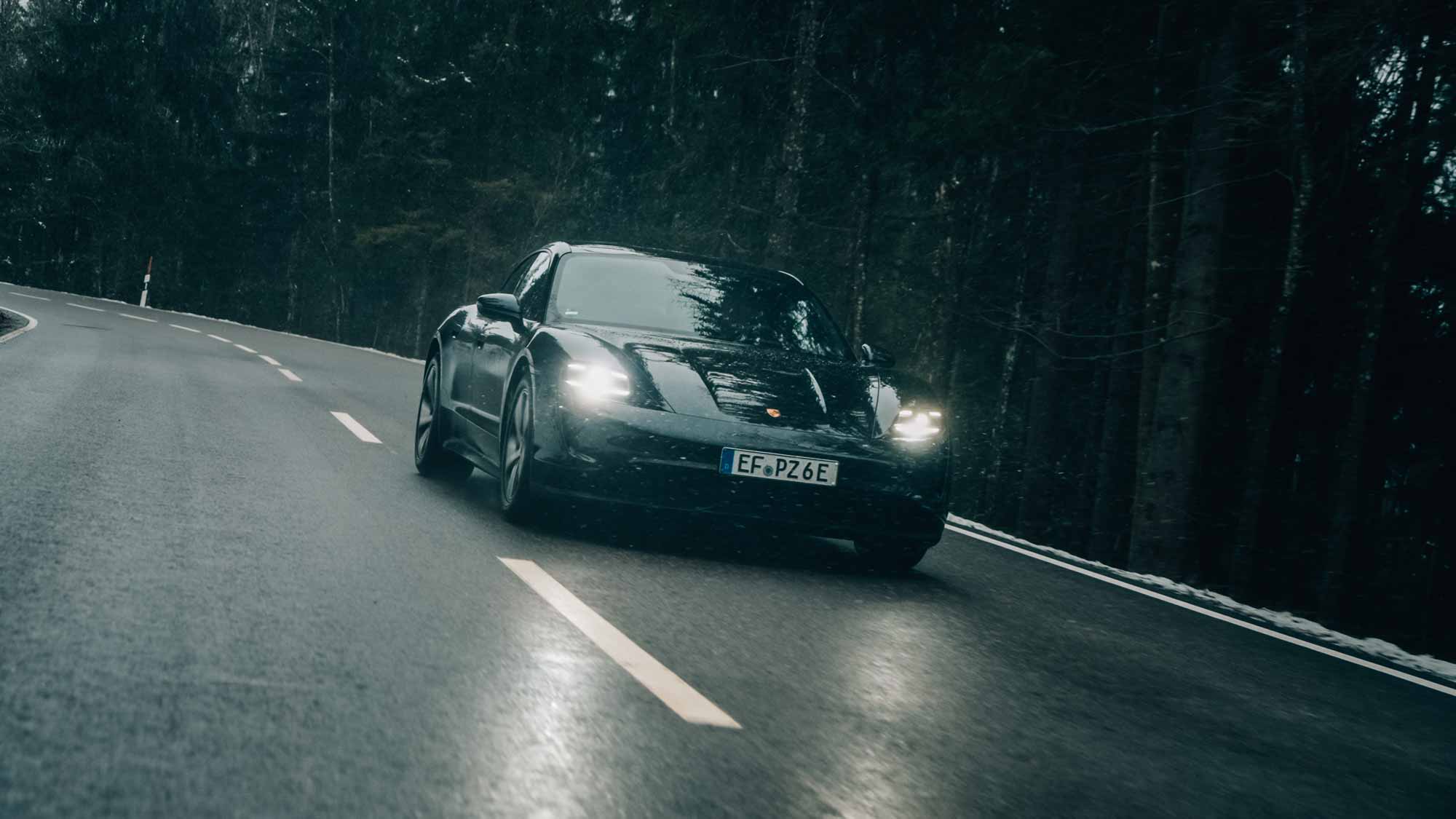 Sleek car on a winding road, ideal for strategic film production, advertising, and storytelling through FPV drone photography for Porsche