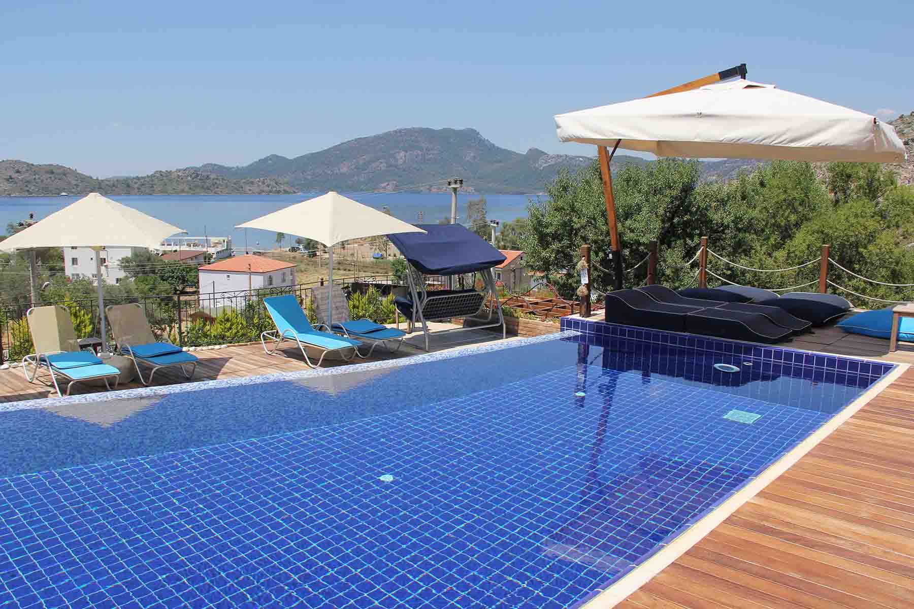 two people looking at a tablet and smiling