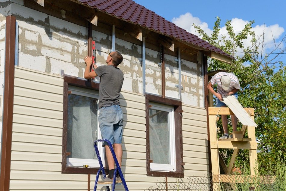 Vinyl lap siding close-up with shadow lines