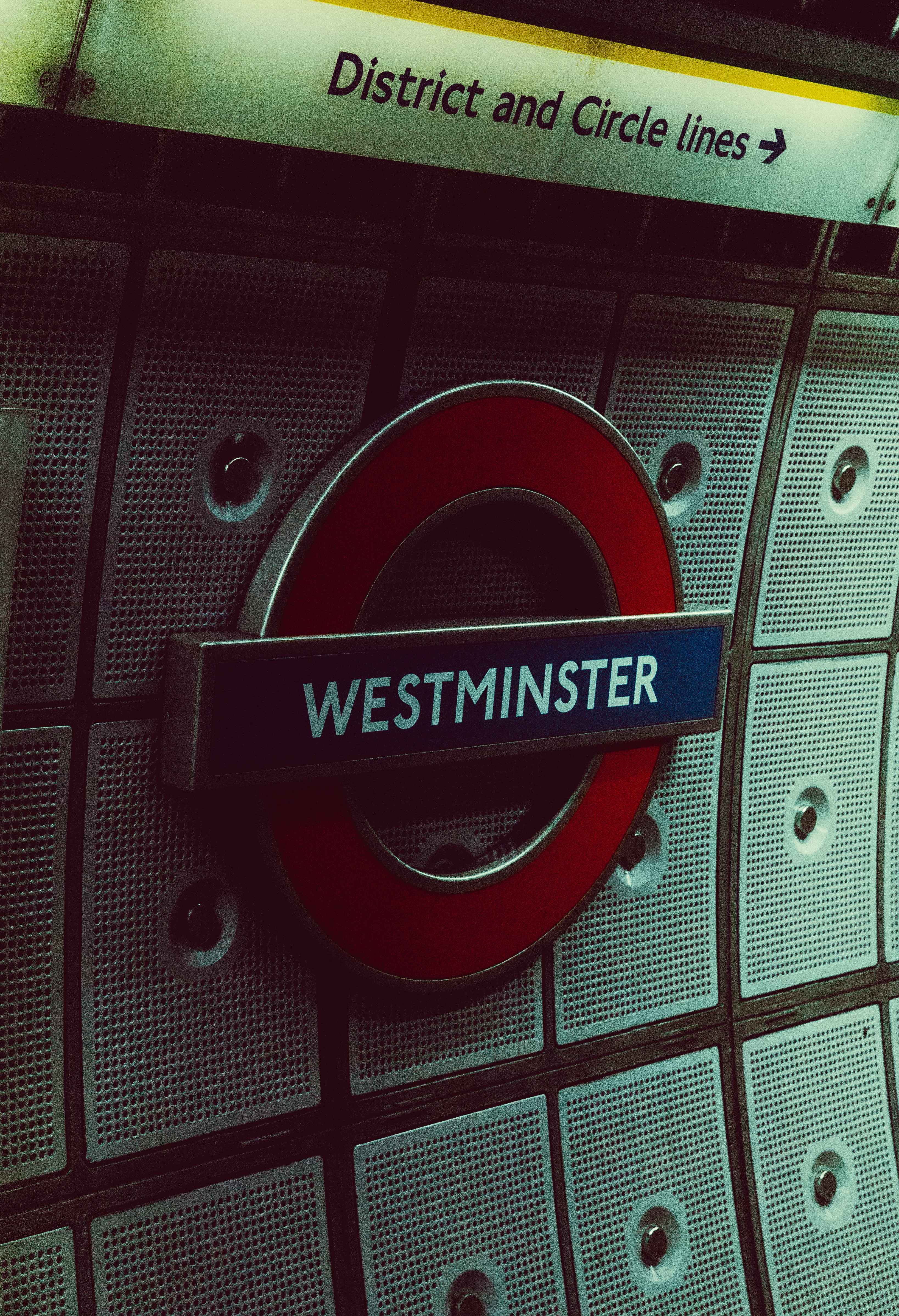 Westminster station sign on tiled wall
