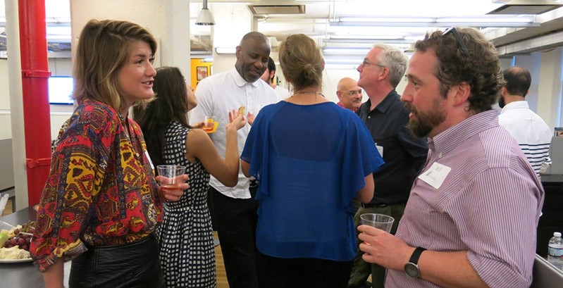 photo of a man and a woman talking