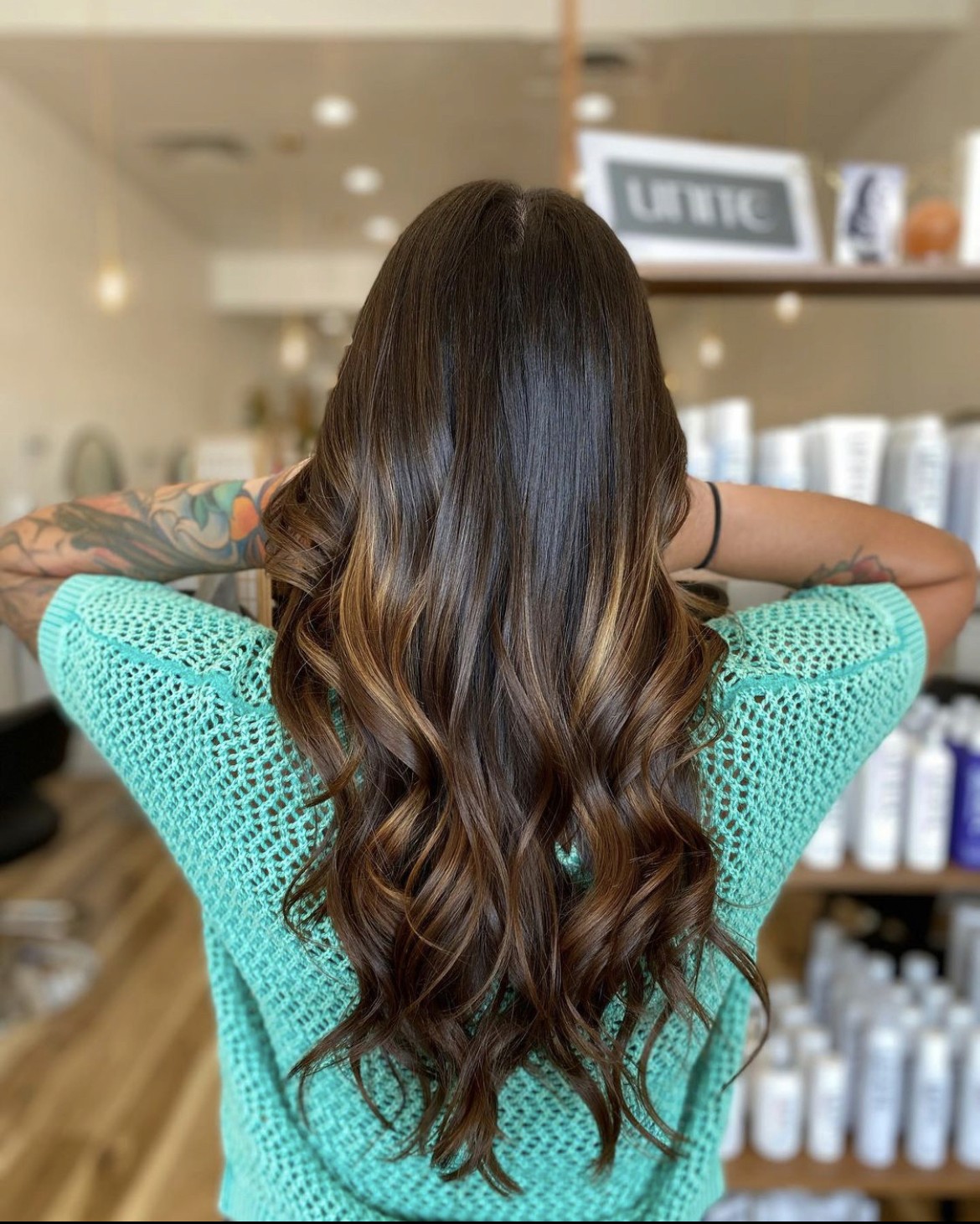 Dimensional brunette with caramel tones at Del Sol Hair Studio, Huntington Beach