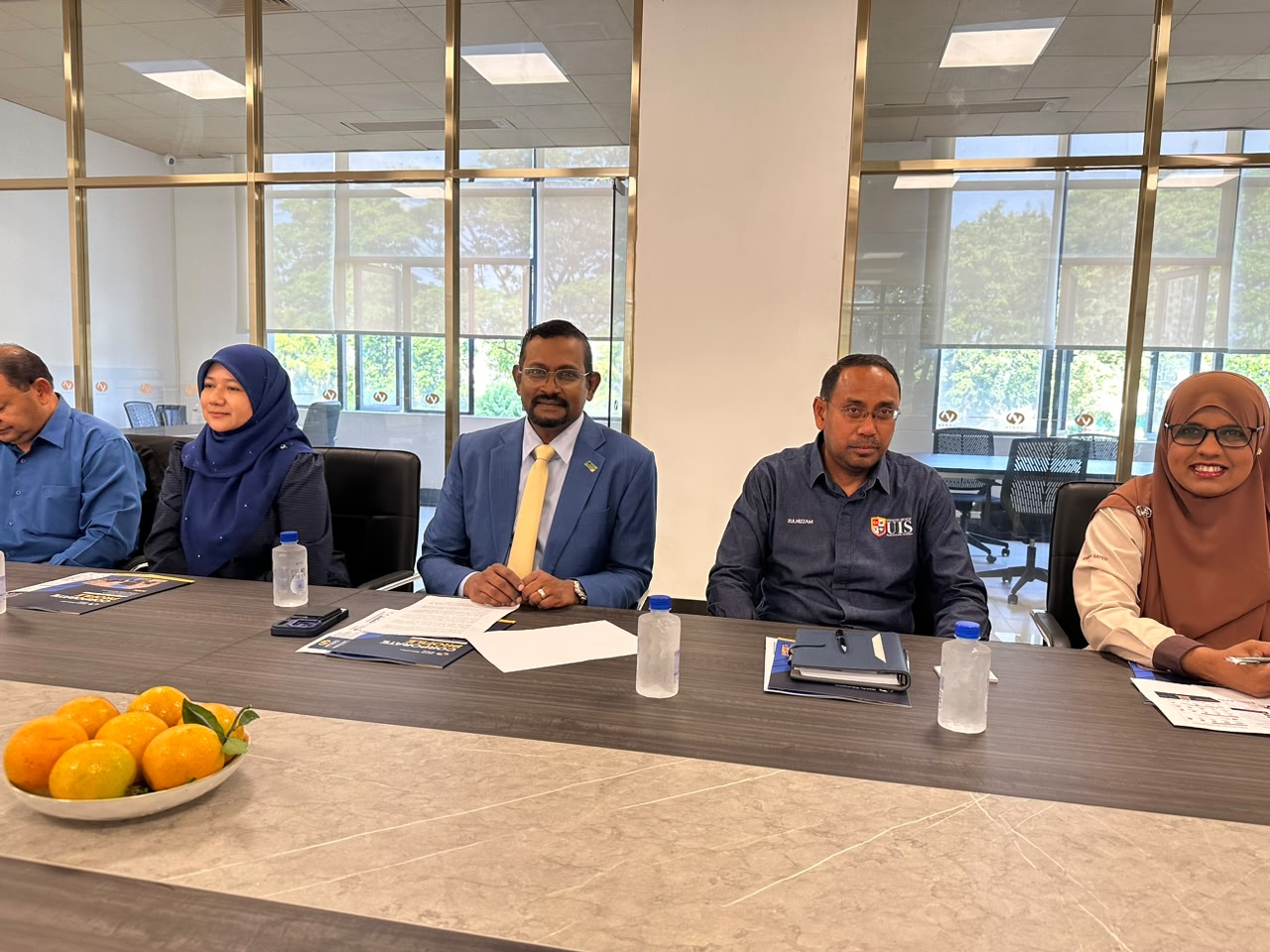 Universiti Islam Selangor delegation seated at the discussion table during the partnership meeting at HYEDU's Foshan office