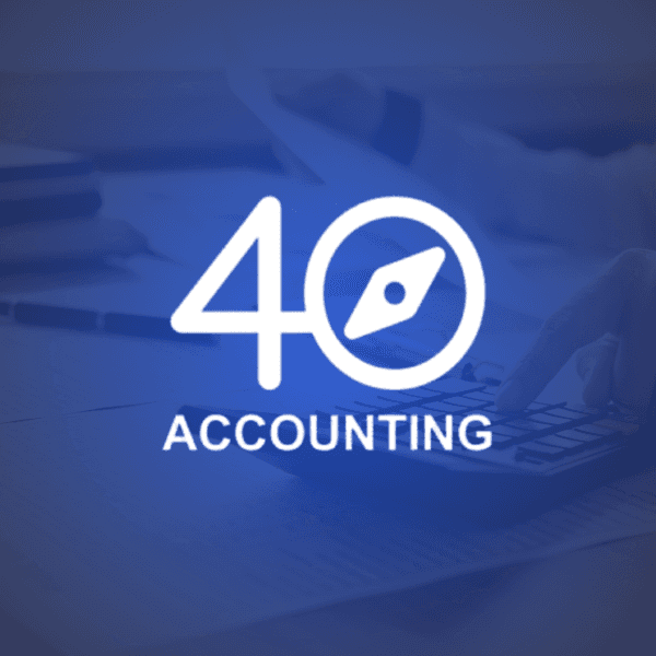 Two men reviewing documents together by a large window, with sunlight streaming in.