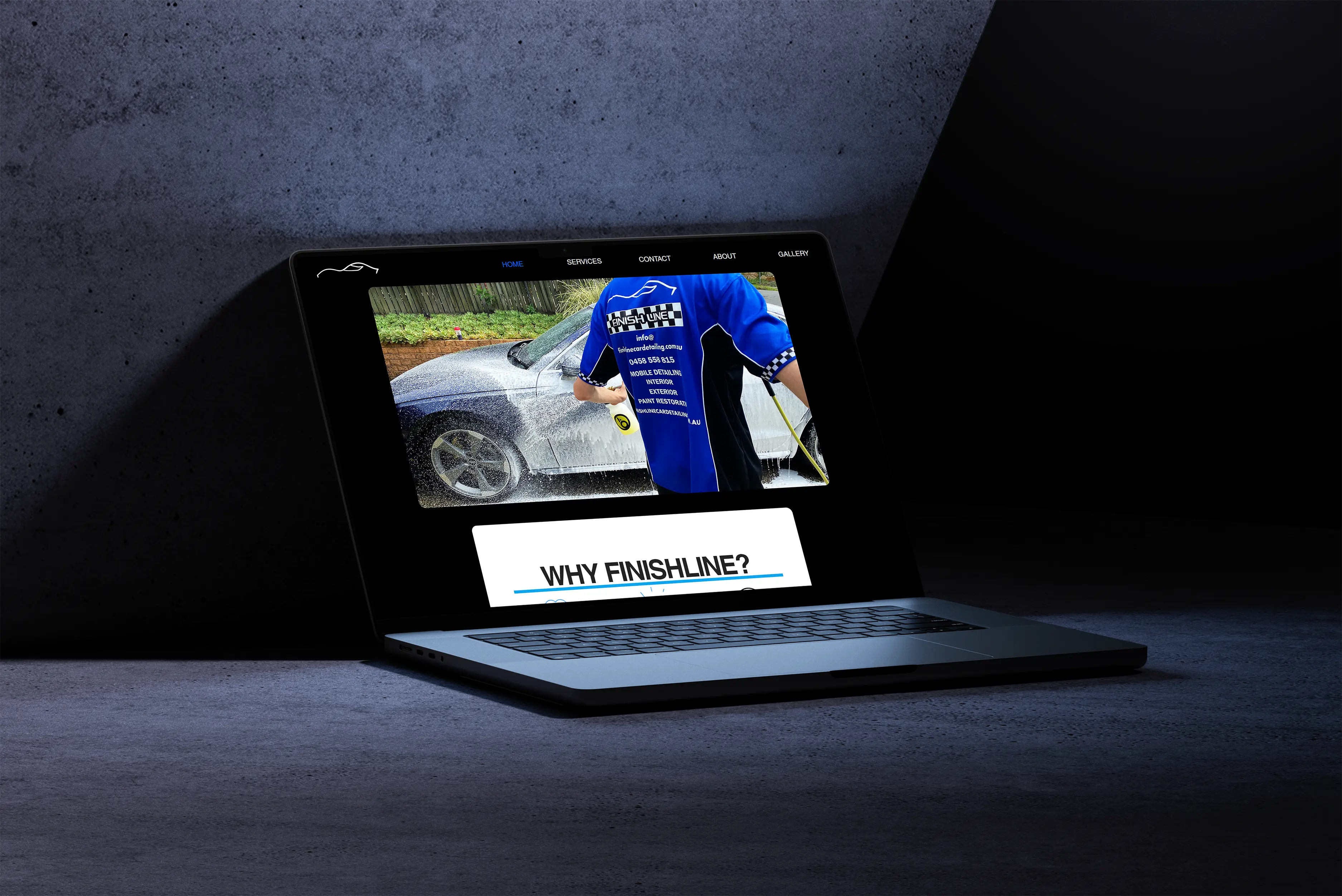 Laptop screen showcasing the Finishline Car Detailing website, a portfolio project by Dylan Coleman, featuring a sleek design with automotive-themed visuals and user-friendly navigation.