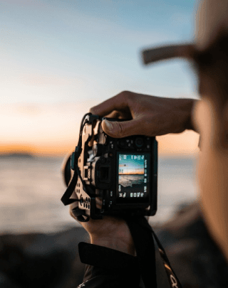 man taking pictues with a camera