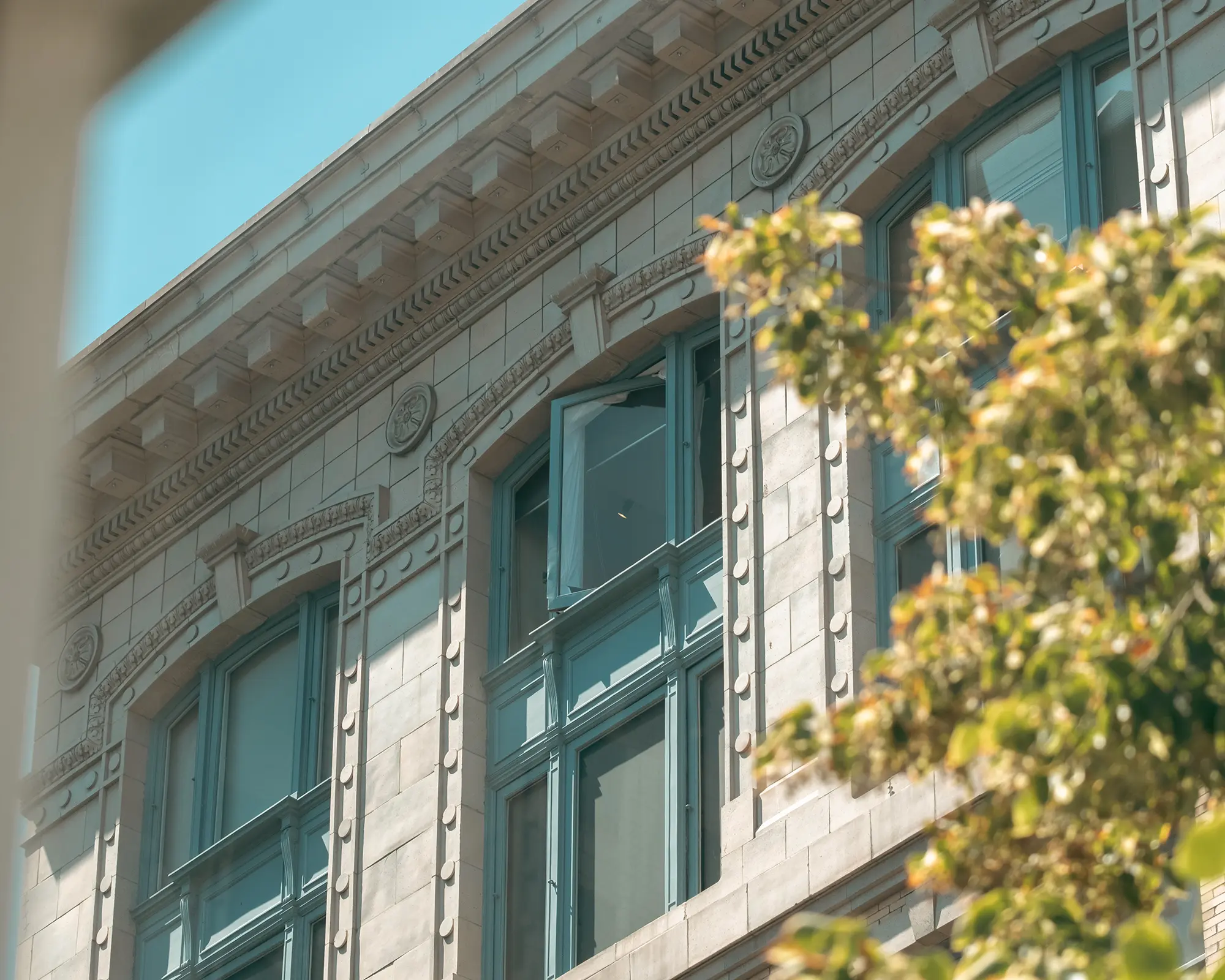 Close-up of a building's upper windows.