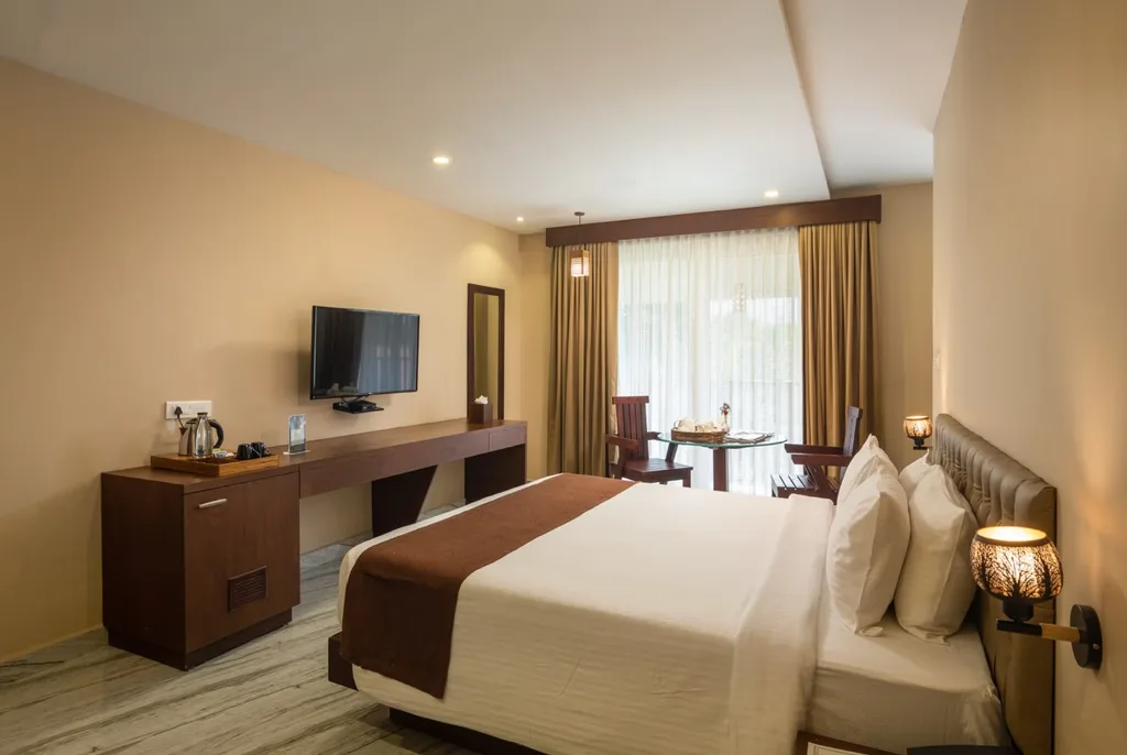 Classic Room with King-Sized Bed at Au Revoir Wellness Resort – Elegant Comfort with Modern Amenities and a Cozy Ambiance