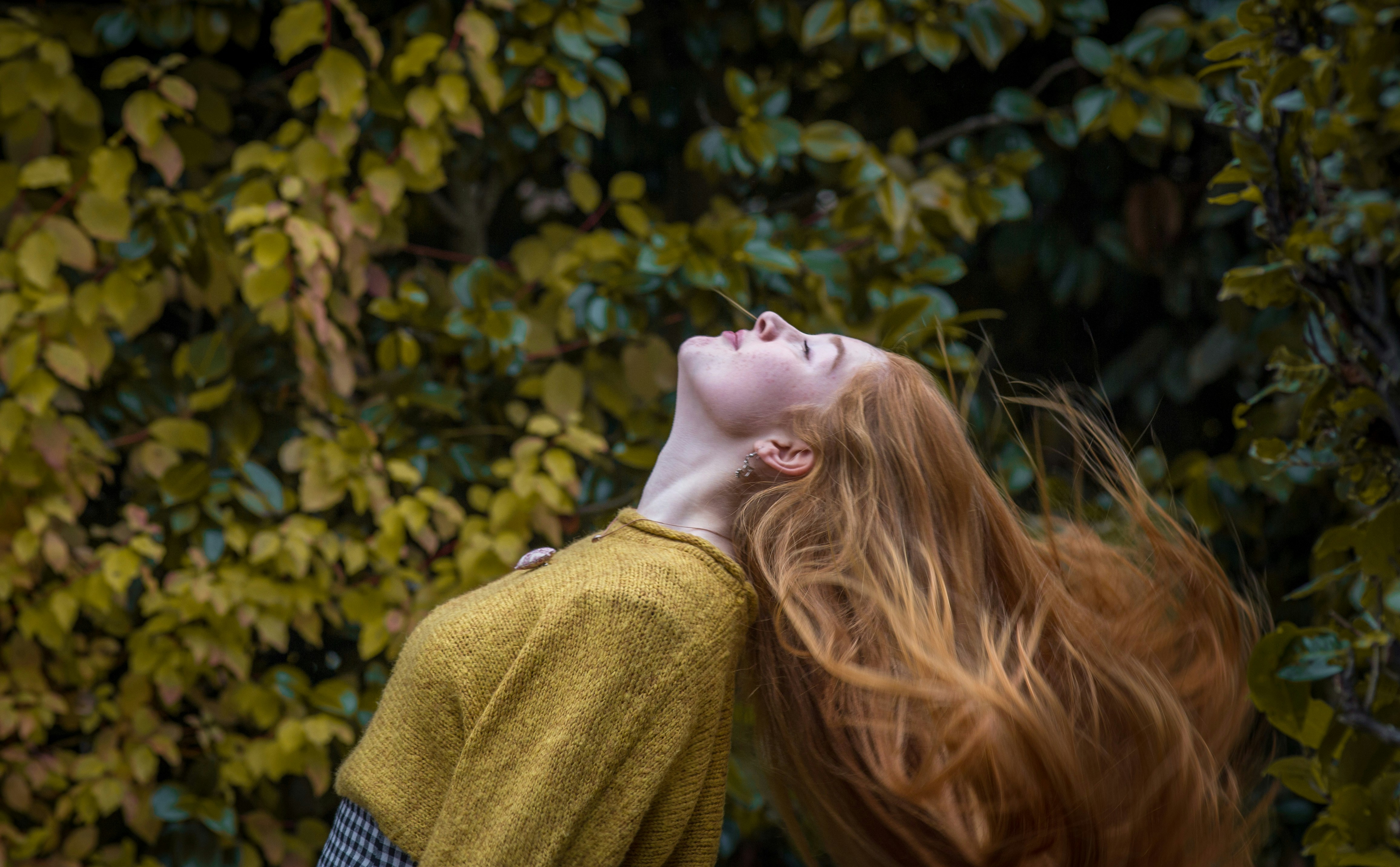 woman enjoying the weather and wind - Seasonal Color Analysis