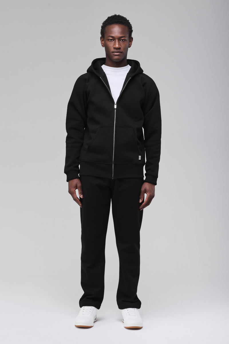 Sunday Superior Belmont Zip Hoodie in clean black, male model front view