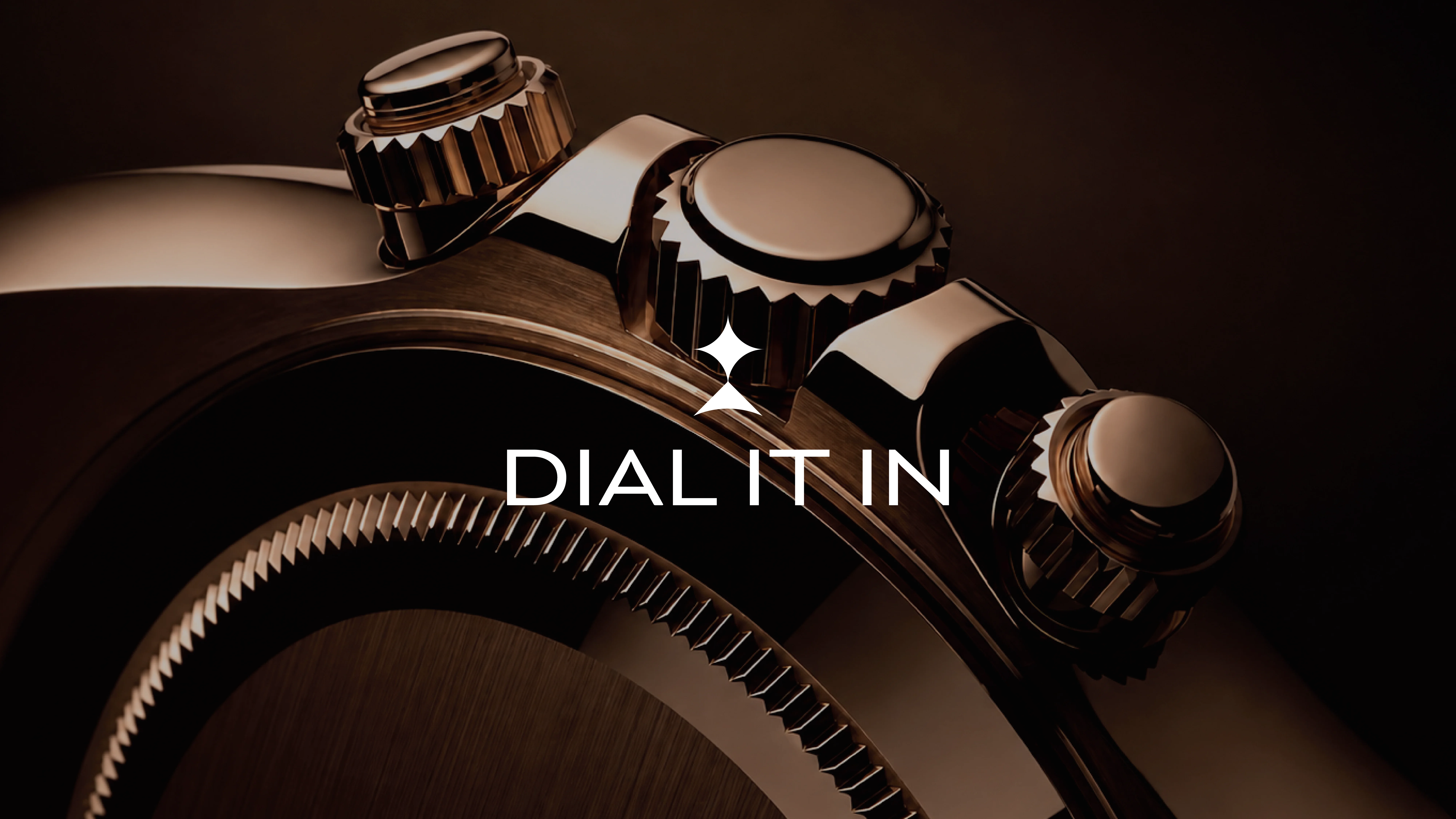 Close-up of a luxury watch crown with intricate grooves and polished metallic finish against a dark background, accompanied by the text "Dial It In" in bold lettering.
