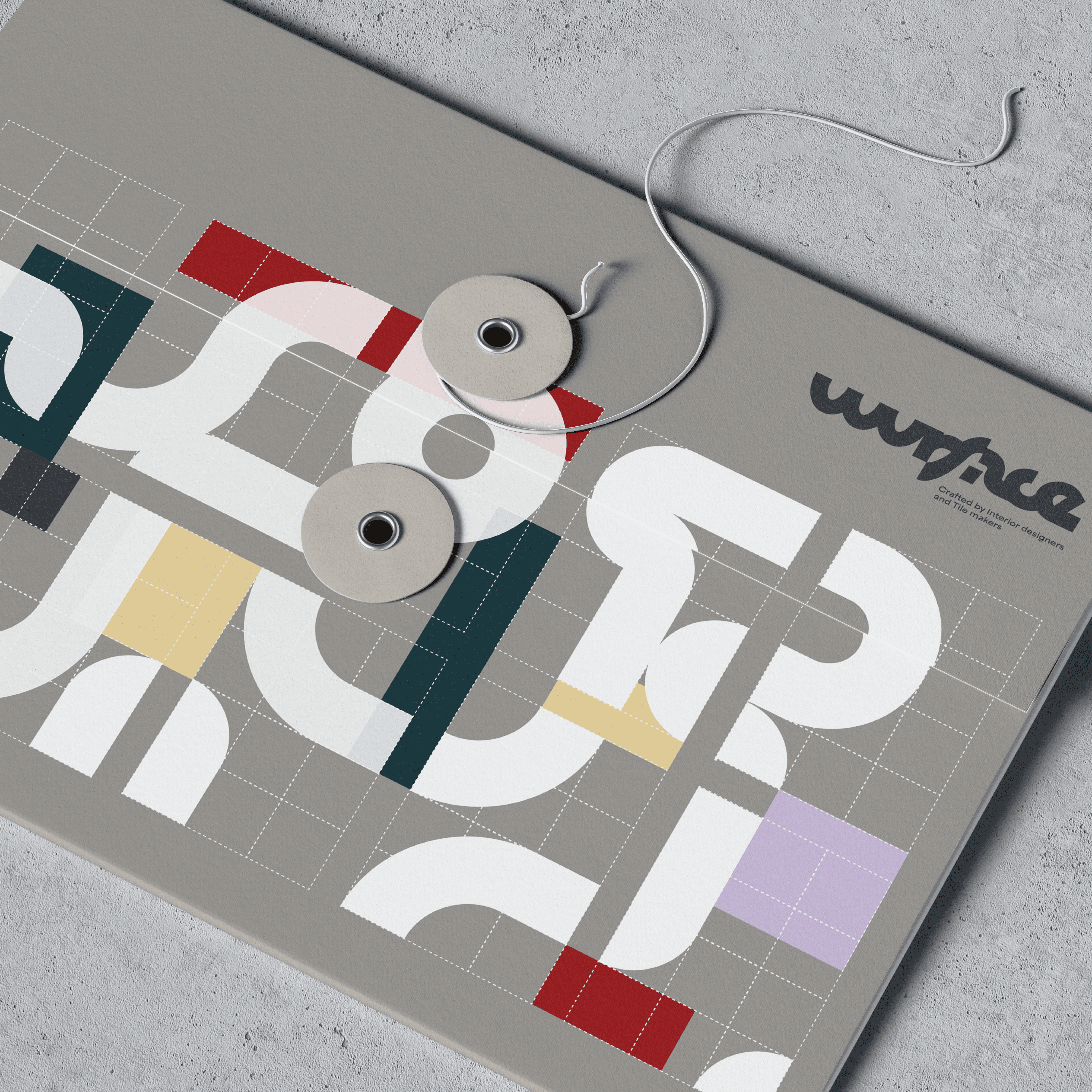 Large printed folder featuring the Wurface modular graphic system designed by Josephine Grenier.