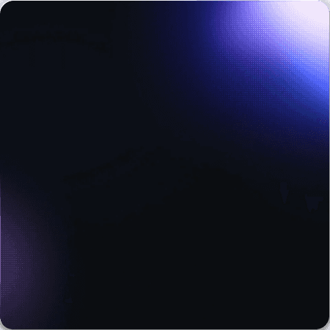Abstract image featuring a dark background with soft, glowing blue and purple light splotches.
