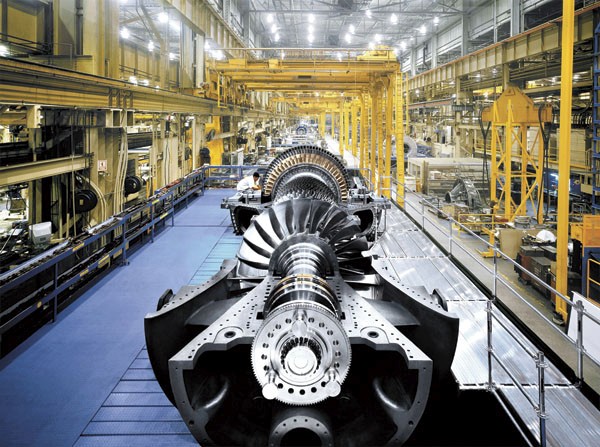 Nuclear steam turbine housed inside a containment area with insulation and monitoring equipment