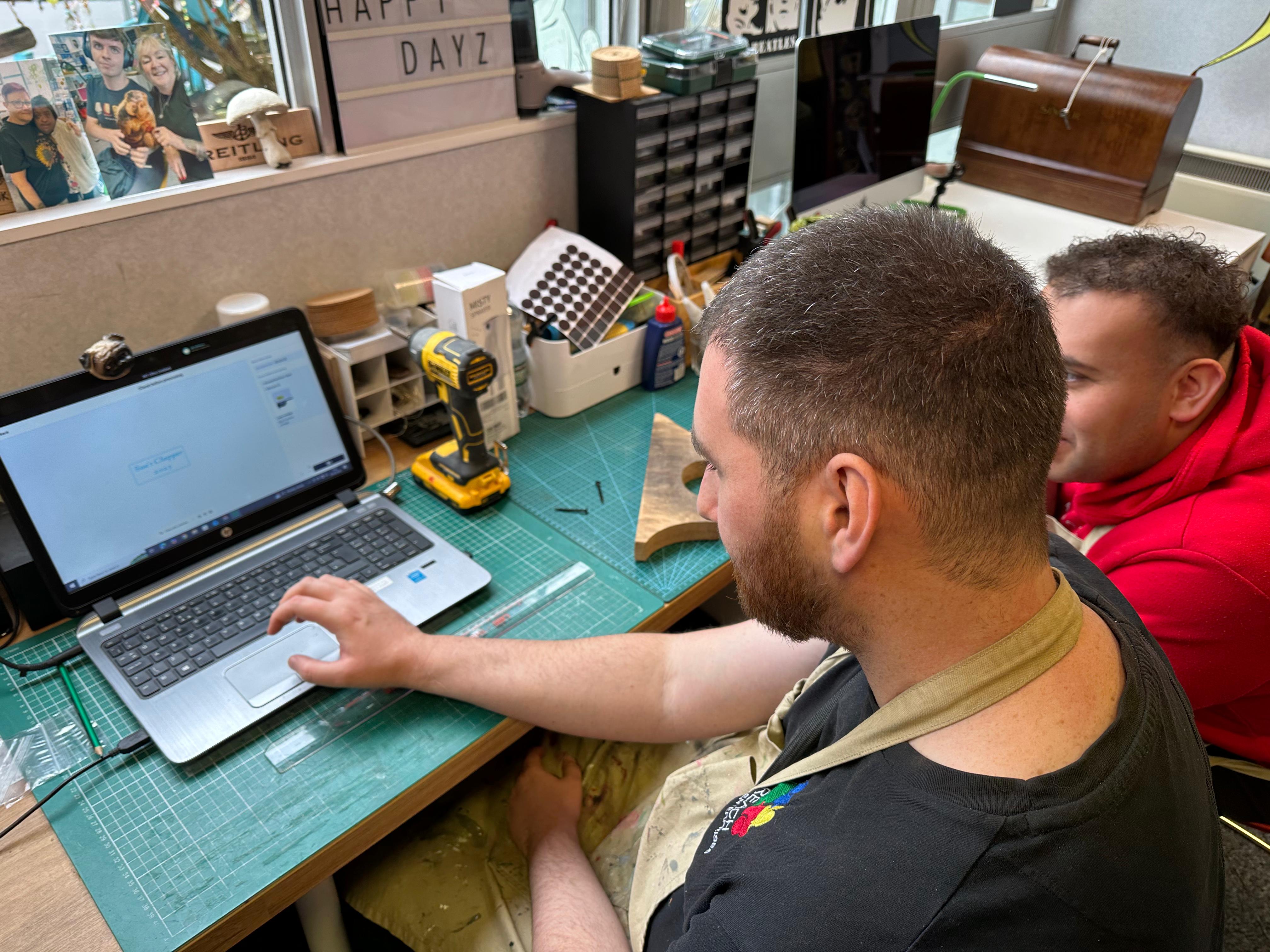 Group of men standing with Sufboard
