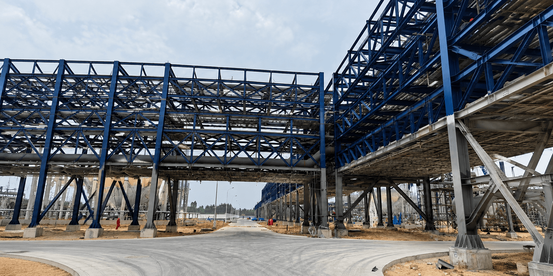 Carbon steel building frame erected on an open construction site