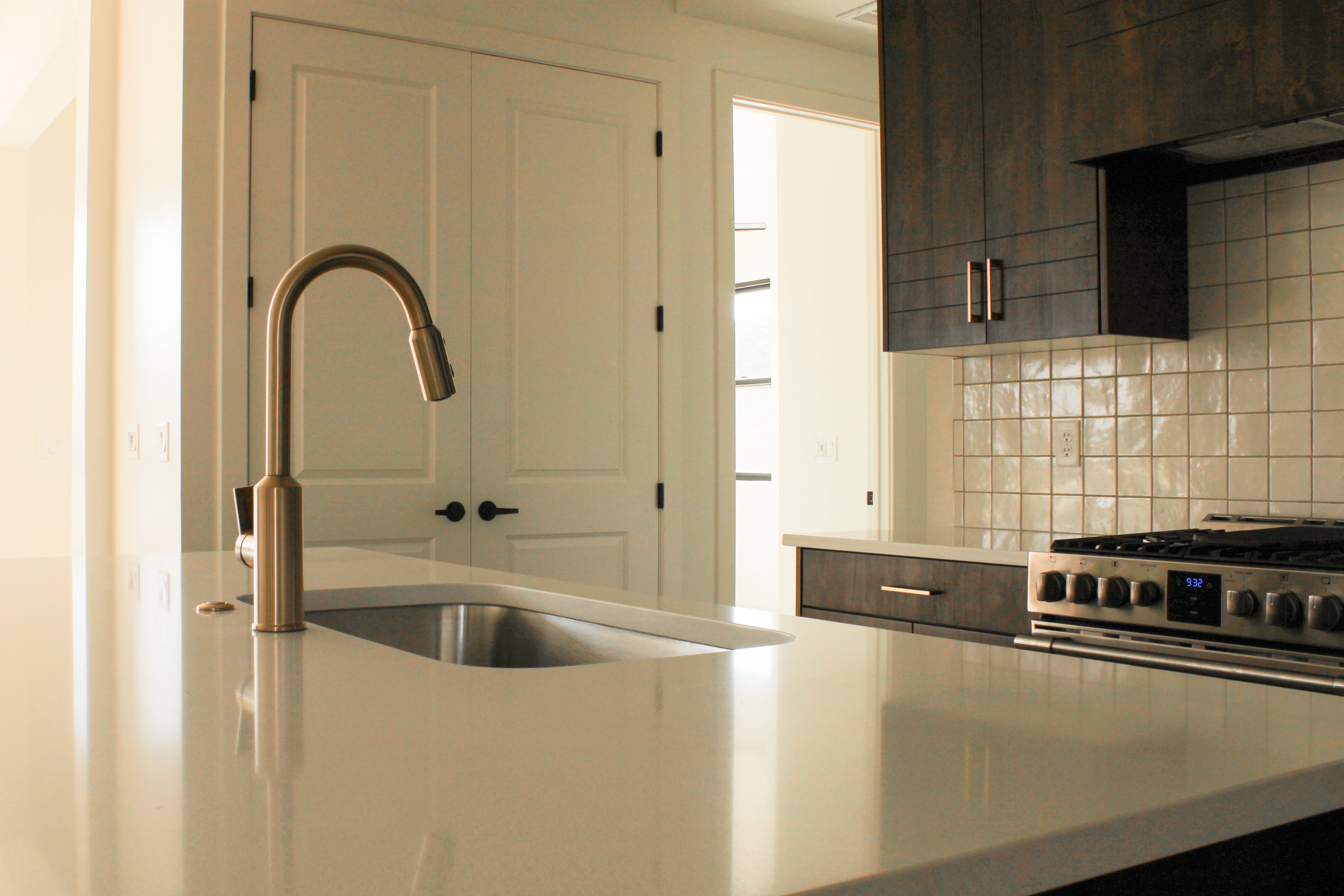 Detailed view of kitchen cabinetry and storage solutions in The Overlook at Falcon Ridge custom home in Hurricane, Utah.