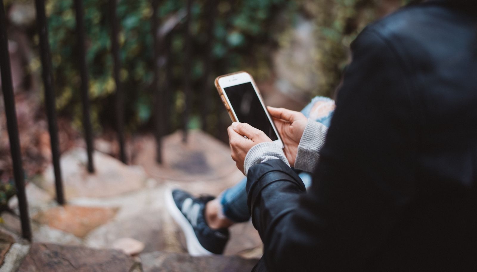 man looking at phone