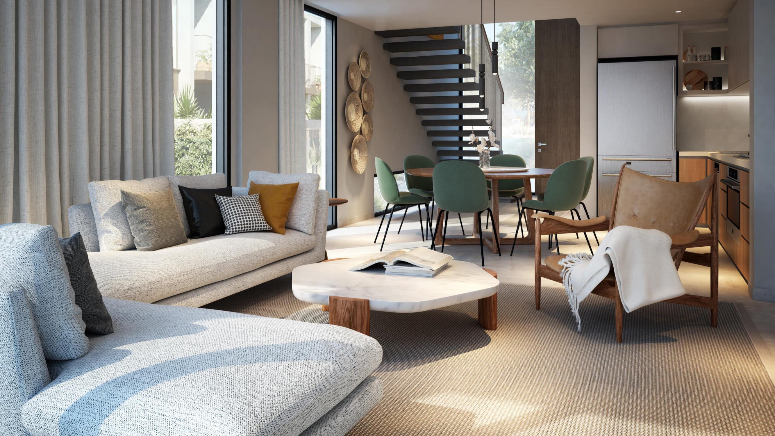 A contemporary living room featuring modern furniture, designed for comfort and style at Talia at the Valley.