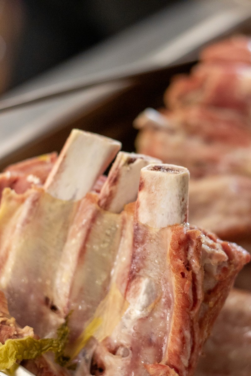 raw meat on brown wooden table