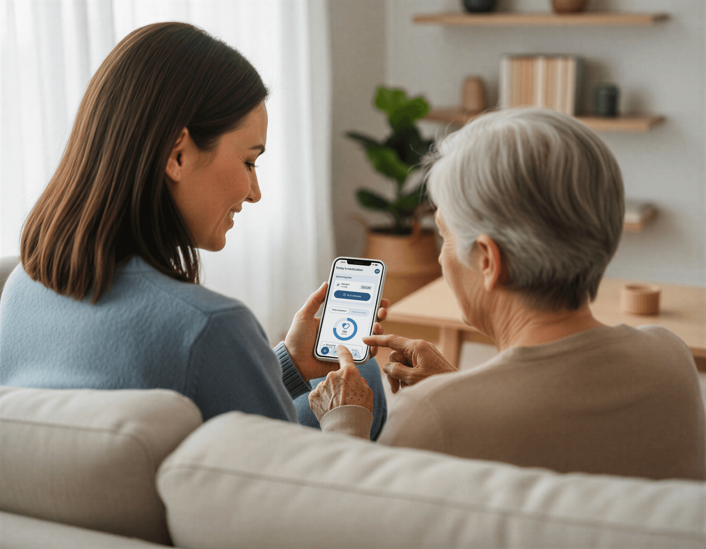 Caregiver programming the treatment on the Medicase app for an elderly patient.
